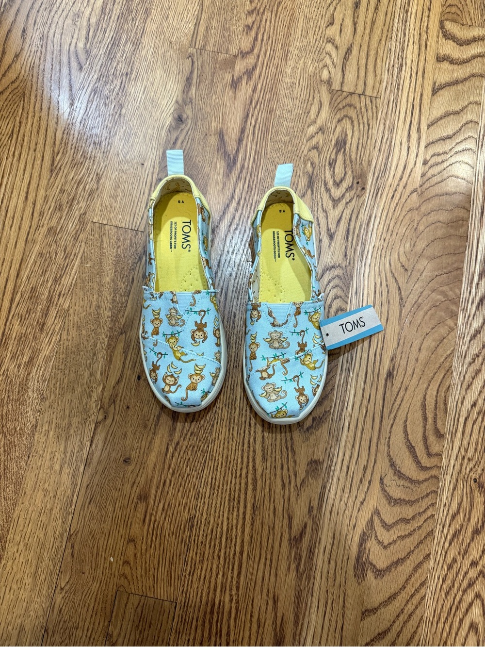Toms Kids Light Blue Monkey Print Slip-On Sneakers